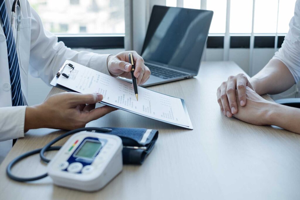 a doctor talks to a patient about outpatient addiction resources near san antonio tx