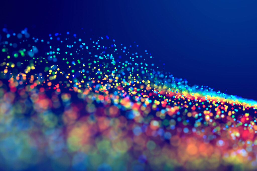 A magnified image of angel dust. The powder looks like fine, multi-colored particles here.