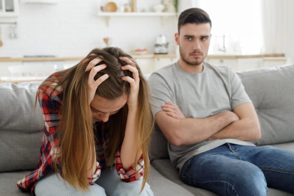 could on couch struggling to communicate while being affected by the impact of addiction and relationships