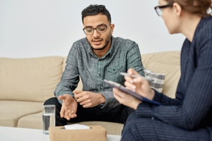 A man participates in dual diagnosis treatment for co-occurring disorders.