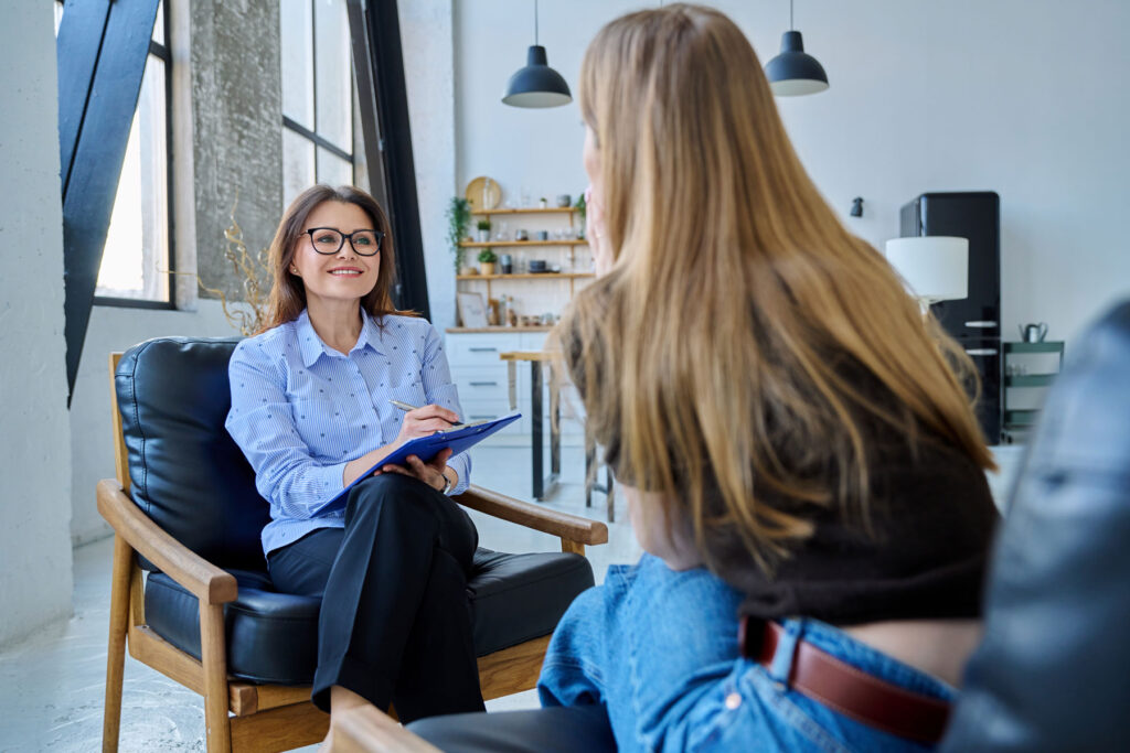 A therapist and a client discuss emotional trauma